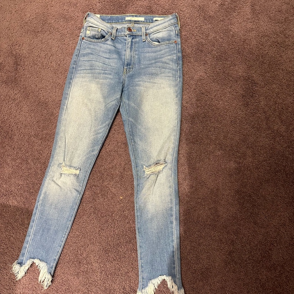 Distressed ripped jeans